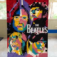 foto de um quadro pintado "the beatles"